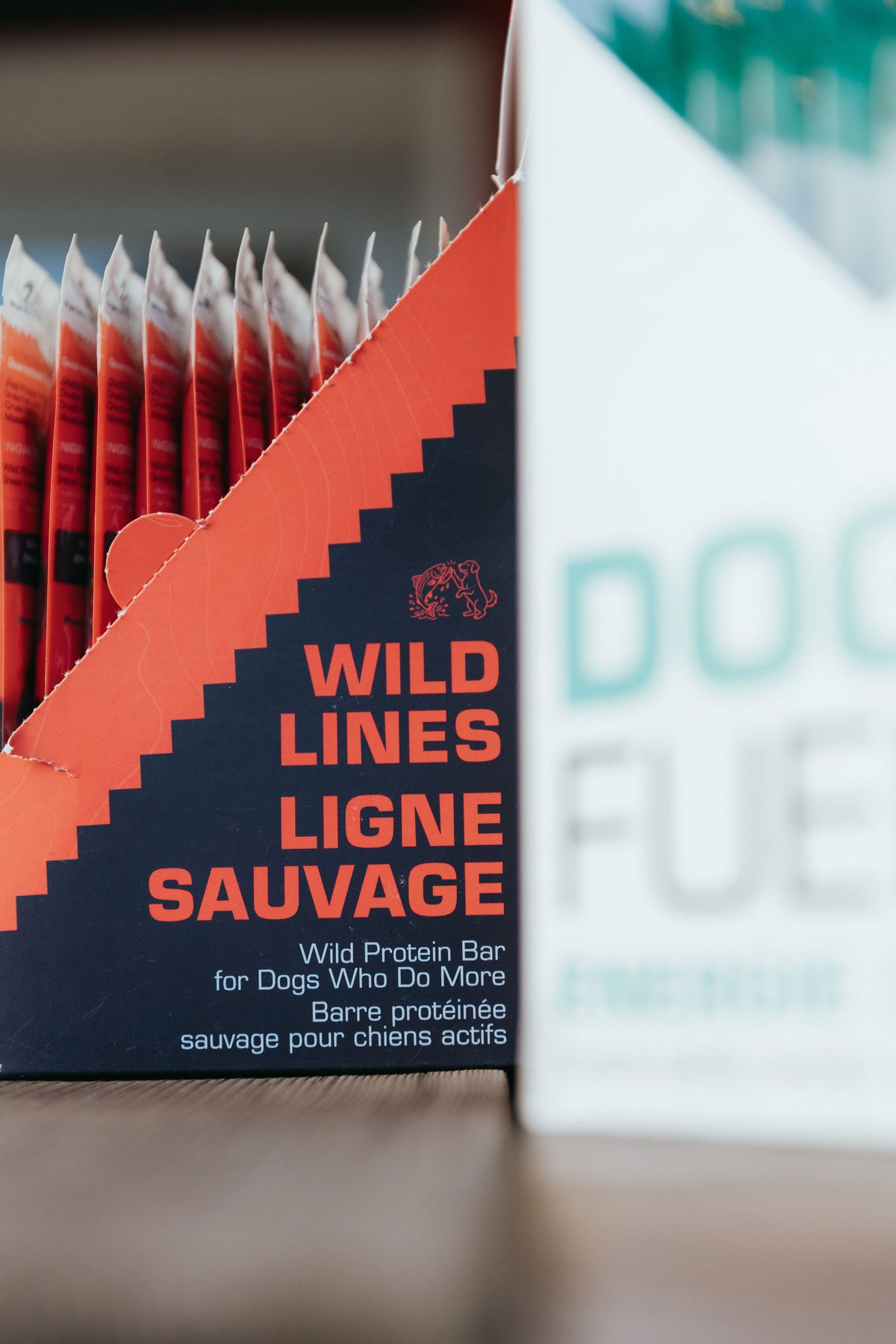FRAPS Wild Salmon and Backcountry Beef display cartons on a counter